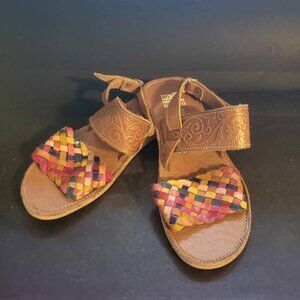 Pair Of Handmade Mexican Leather Hechoen Sandals With a Multi-Color Woven Strap